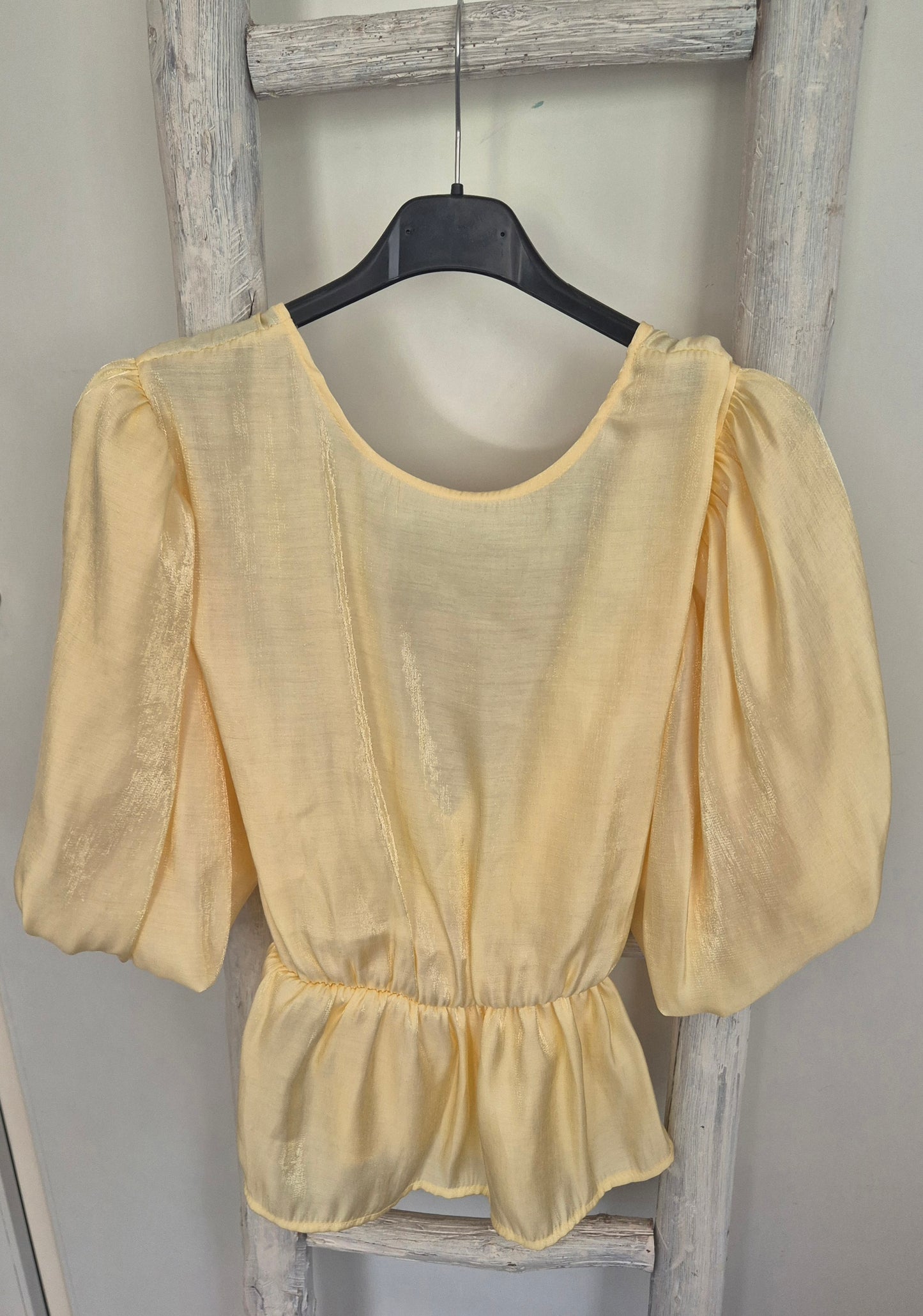 Blouse met strik en open rug